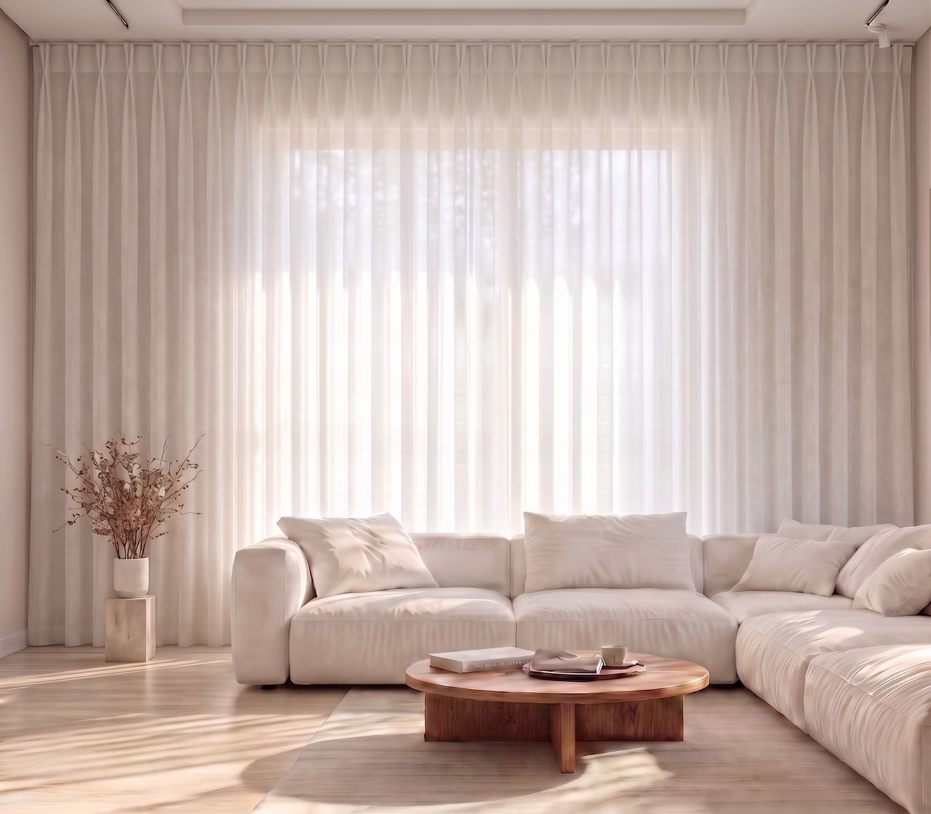 Pleated sheer curtains with a visible header filtering daylight in a bright modern living room