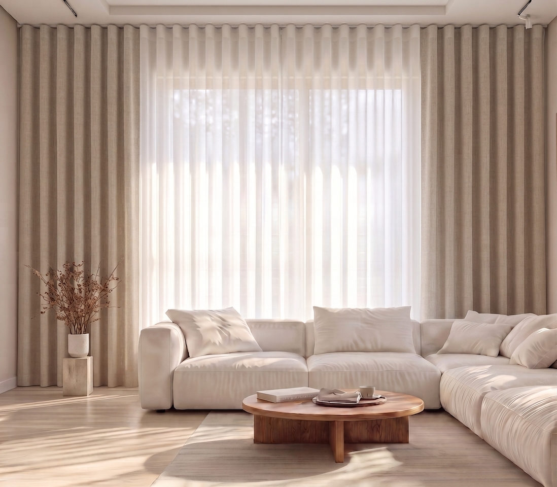 Twin track wave style sheer and blackout curtains in a luxury living room